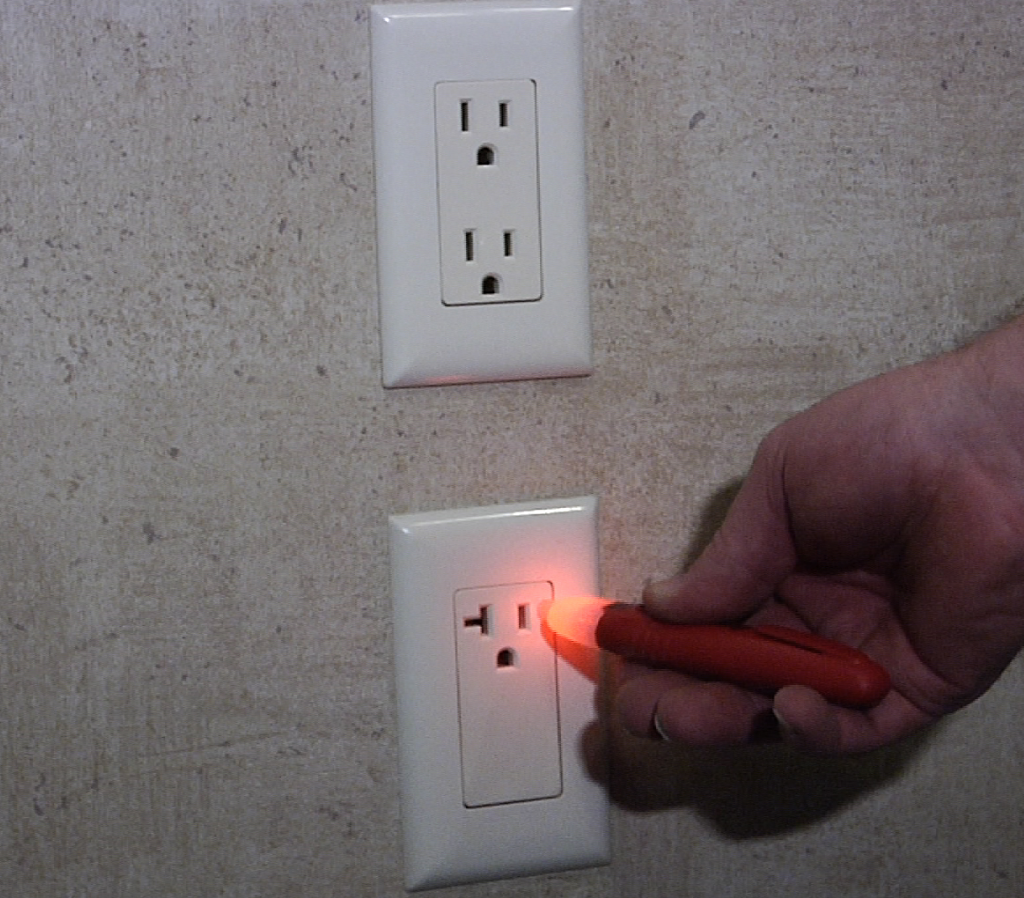 RV technician diagnosing a shore power issue on an RV in Stuart